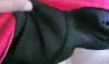 A woman with a lighted candle wax filled breasts and vagina in the candle sex tube in the conversation of sex